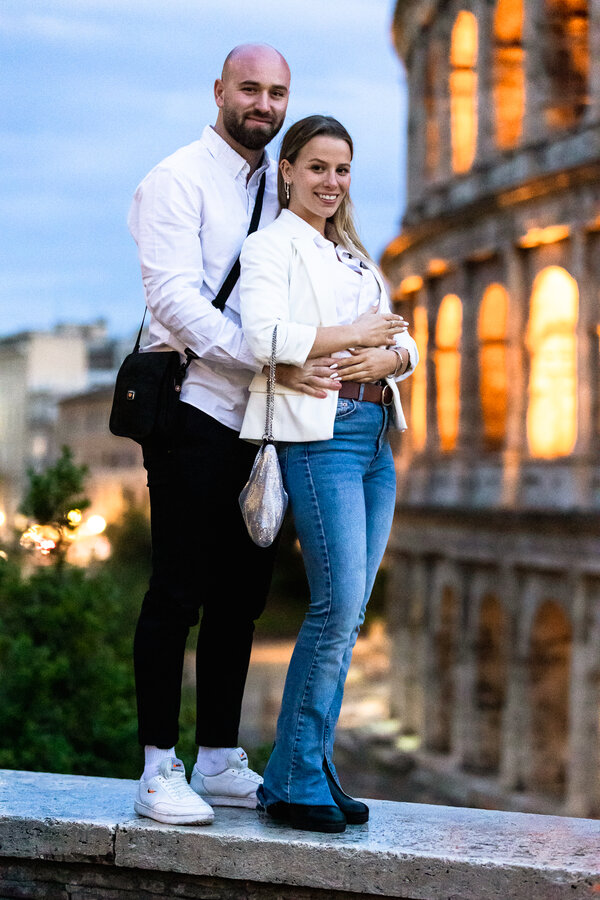Newly-engaged couple posing during their proposal photo session on the Oppian Hill