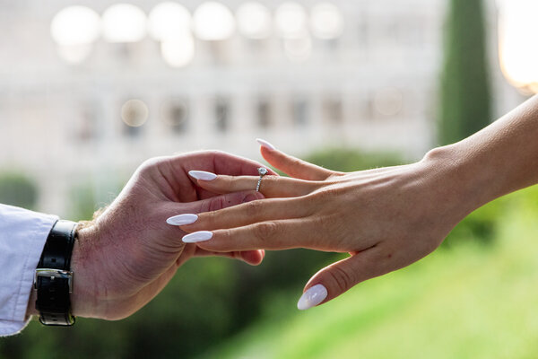 Detail of the engagement ring during a surprise proposal photo session in Rome