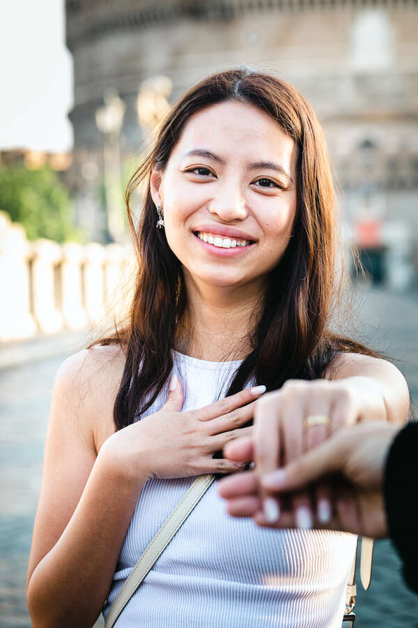 Smiling fiancée during her wedding proposal photoshoot in Rome