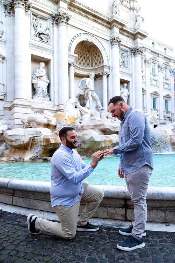 Gay Surprise Wedding proposal at the Trevi Fountain at sunrise in Rome