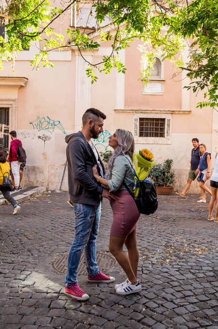 A couple on vacation in Trastevere, Rome