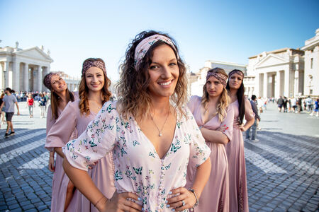 Iconic image of future bride and bridesmaids in St Peter's Square for a bachelorette photo session