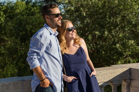 Couple at the Pincio Gardens in Rome, enjoying the summery sun