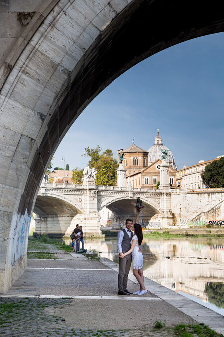 A portrait of the newly-wed couple under Castel Sant'Angelo Bridge