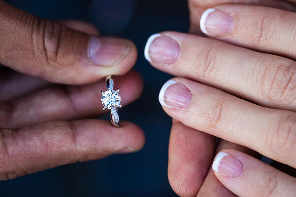 Top down close-up of a beautiful engagement ring during a surprise proposal photoshoot in Rome