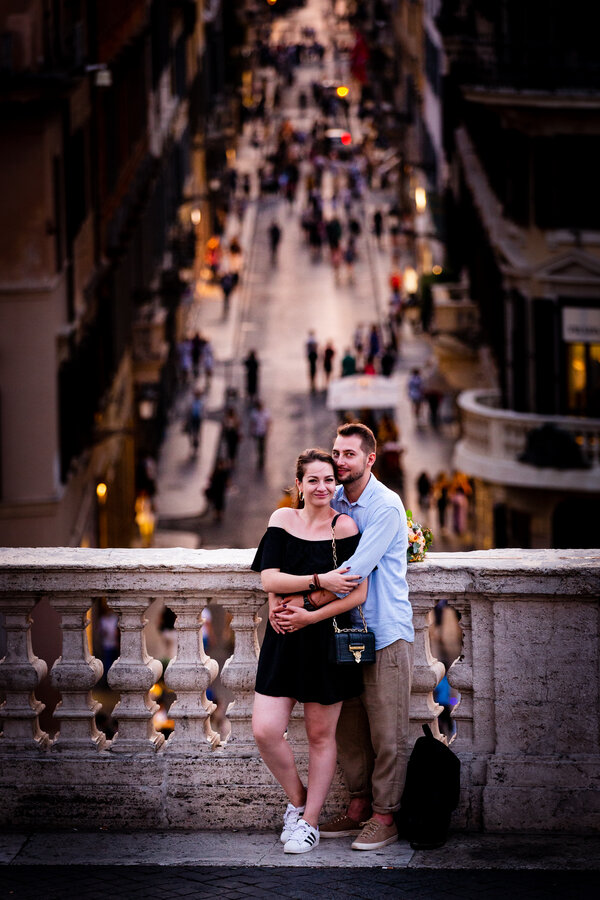 Newly-engaged couple on the Spanish Steps during their proposal photo session in Rome