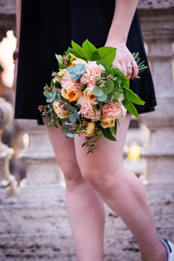 Detail of a proposal bouquet during a proposal photo shoot in Rome