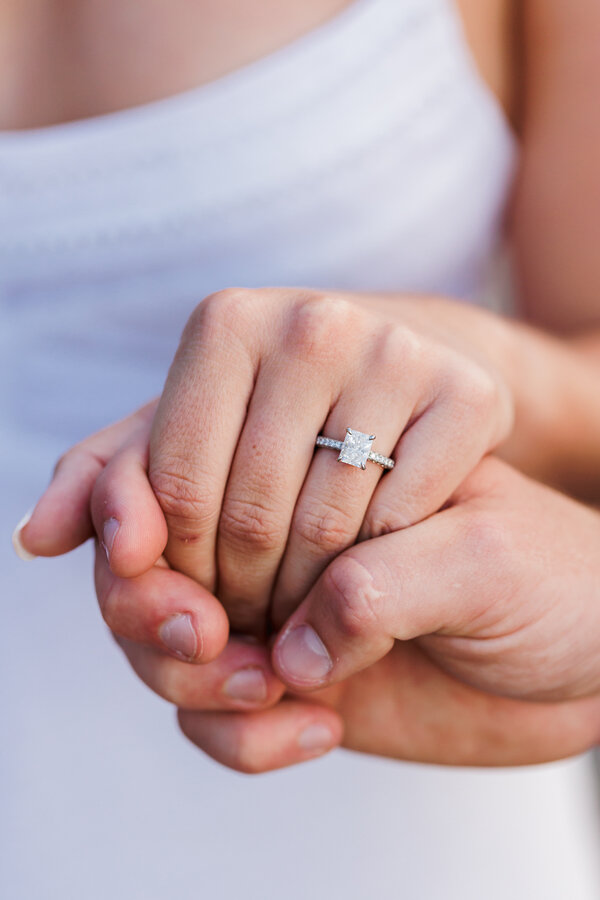 Close-up of woman's hand wearing the engagement ring in Rome