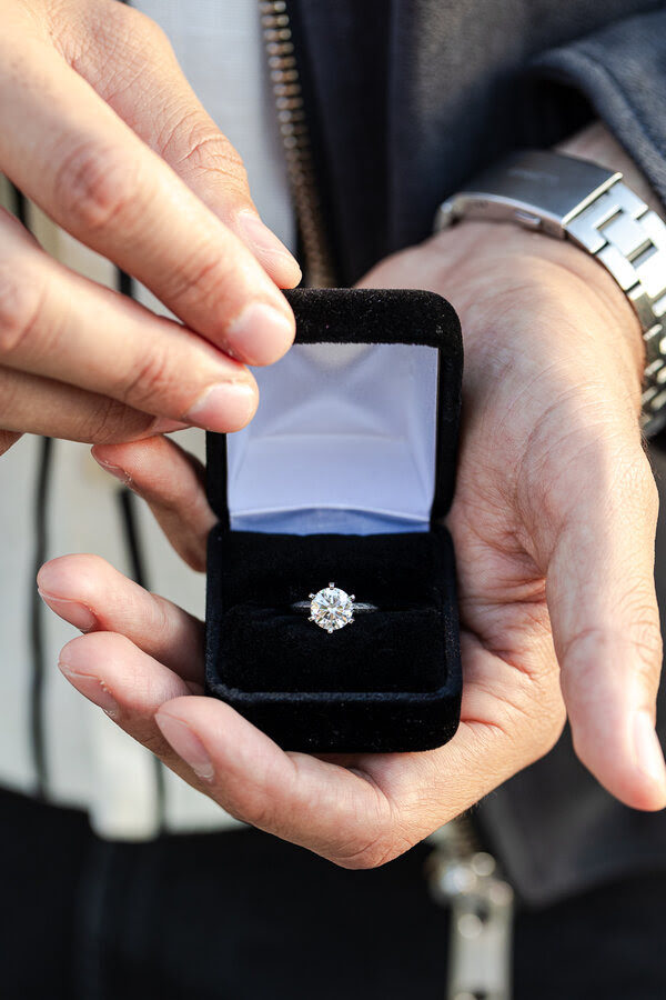 Detail of a diamond engagement ring in the ringbox