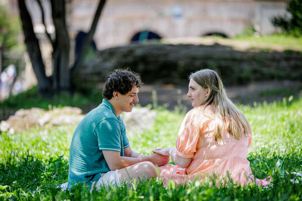 Romantic moment during a picnic on the Oppian Hill in Rome