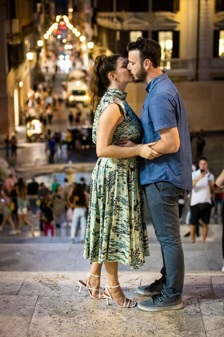 Newly-engaged couple looking at each other at the Pincio Terrazza Belvedere in Rome