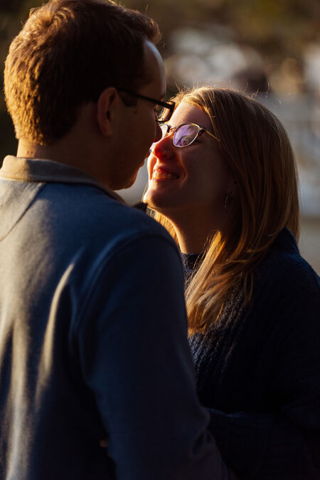 Couple smiling at each other during their engagement photo session in Rome