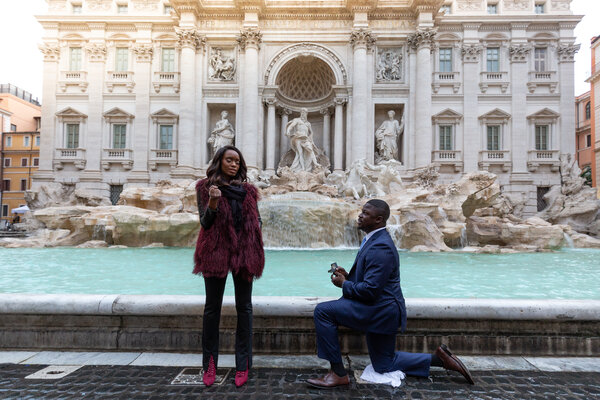 Surprise Proposal at the Trevi Fountain at sunrise