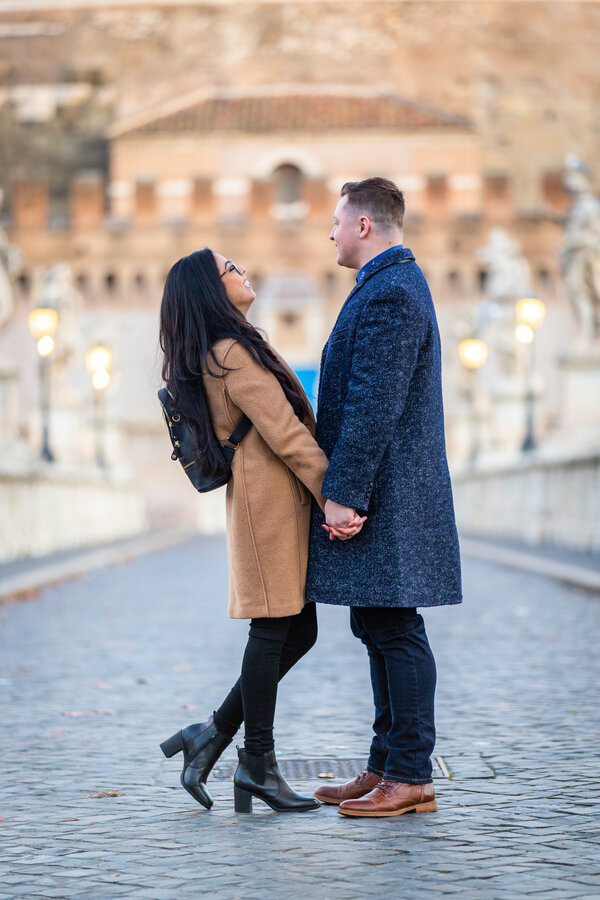 Newly-engaged couple on their engagement photo session at sunrise in Rome