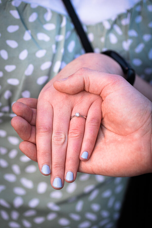 Close-up image of the engagement ring during a surprise proposal photoshoot in Rome