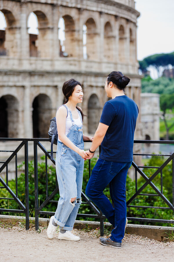 Couple holding hands at the Giardinetto del Monte Oppio, moments before their surprise wedding proposal in Rome