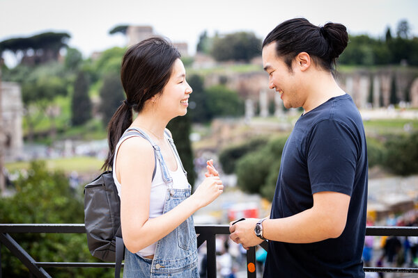Beautiful couple during their suprise proposal photoshoot in Rome near the Colosseum