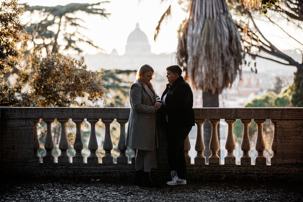 Newly-engaged couple at the Pincio Gardens with the Vatican in the background