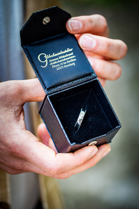 Close-up of an engagement ring during a proposal photo session in Rome