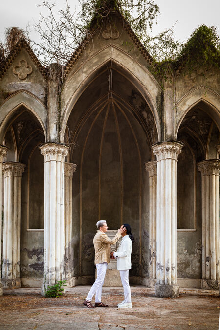 Couple during a proposal photo session at the secret gothic temple in Rome