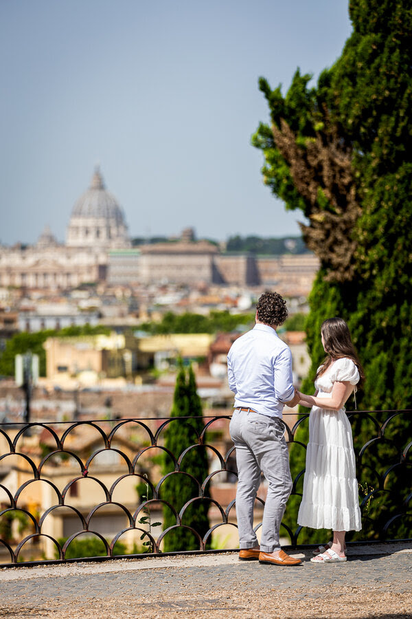 Couple at the Pincio Gardens in Rome moments before their surprise wedding proposal in Rome