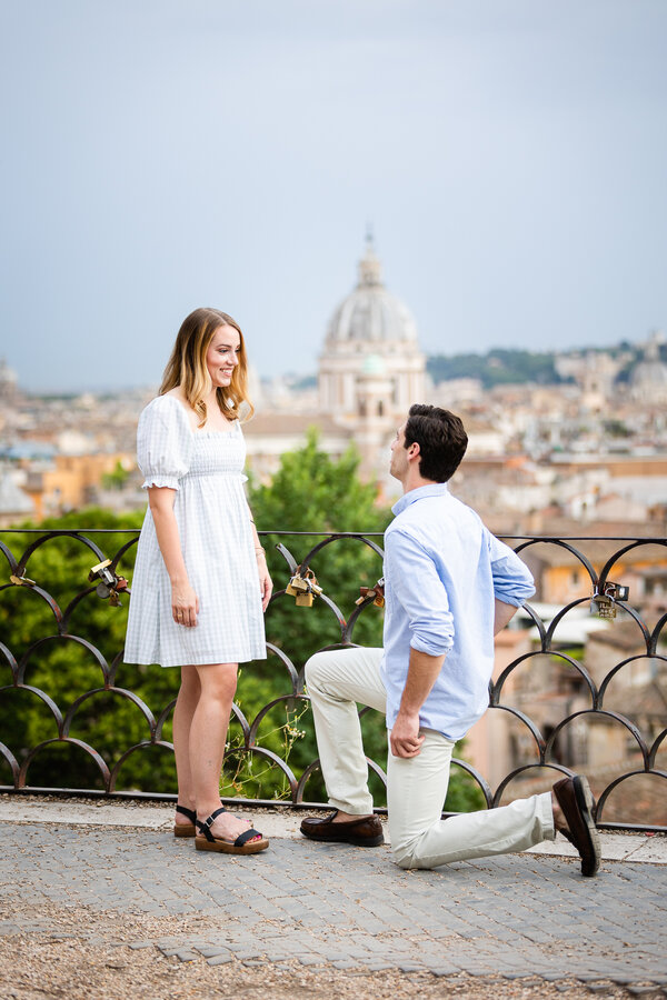 Surprise proposal on the Terrazza Belvedere on the Pincian Hill at sunset