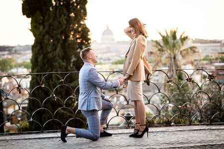 Surprise marriage proposal at the Terrazza Belvedere in Rome at sunset