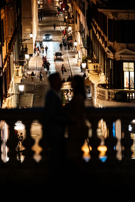 Newly-engaged couple at the Spanish Steps at night
