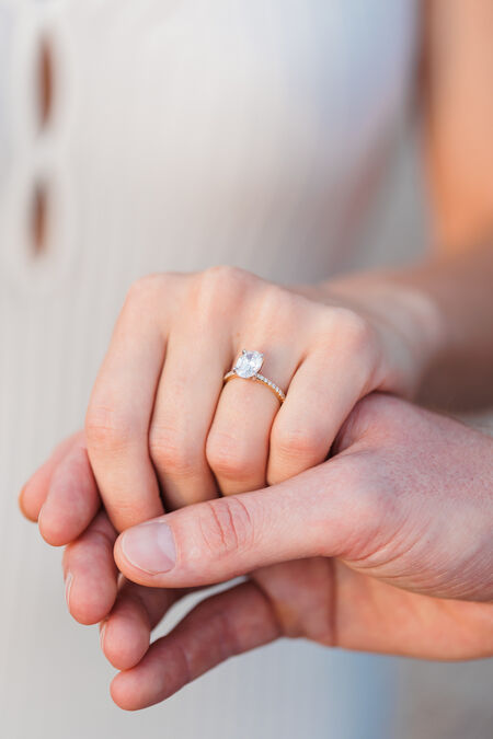 Close-up of the engagement ring on a beautiful woman's hand