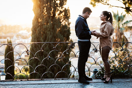Couple at the Pincio Gardens during their surprise proposal photoshoot in Rome