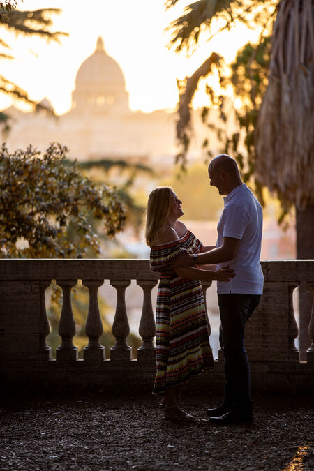 Couple celebrating their love during a proposal photo session in the heart of Rome