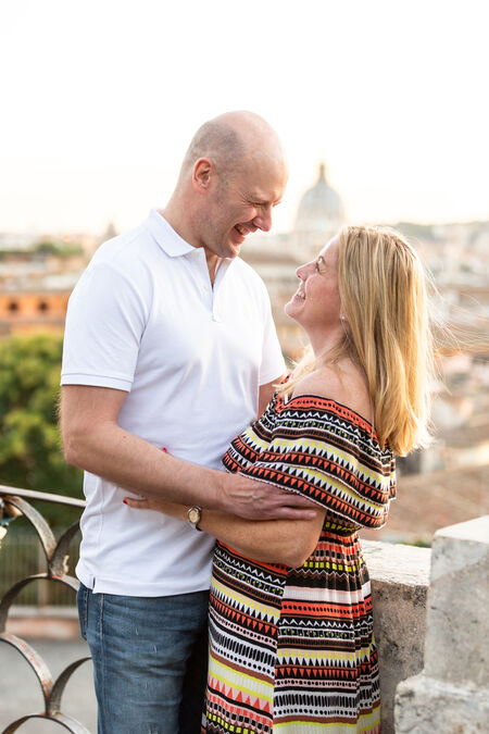 Couple smiling during their proposal photo shoot in Rome