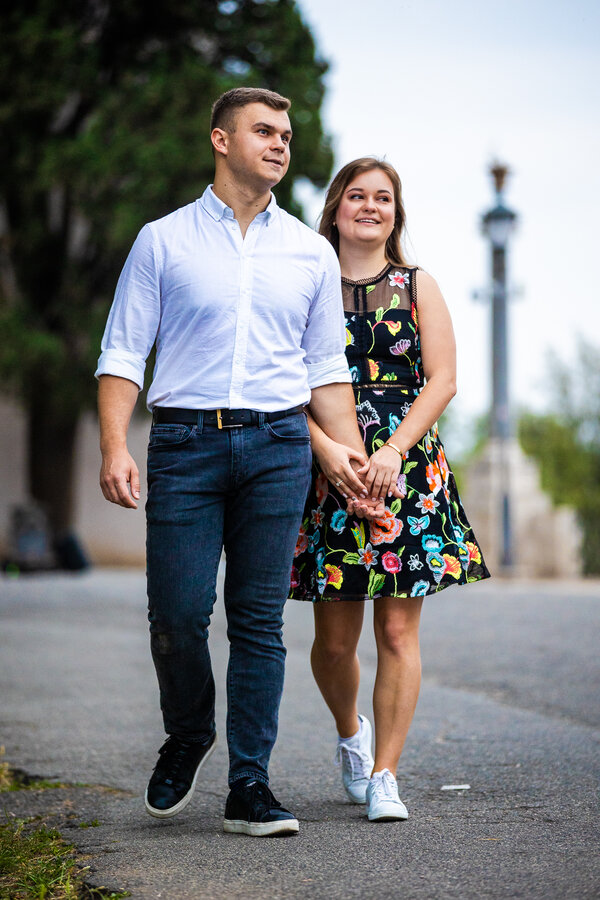 Newly-engaged couple strolling on the Pincian Hill in Rome