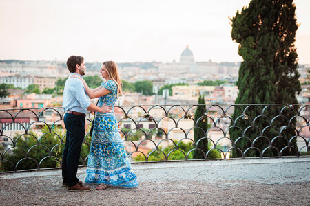 Couple during their surprise proposal photo shoot on the Terrazza Belvedere in Rome