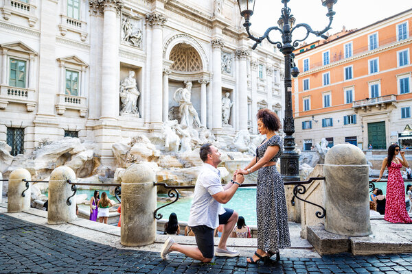 Surprise Marriage Proposal photo session at the Trevi Fountain in Rome in the early morning