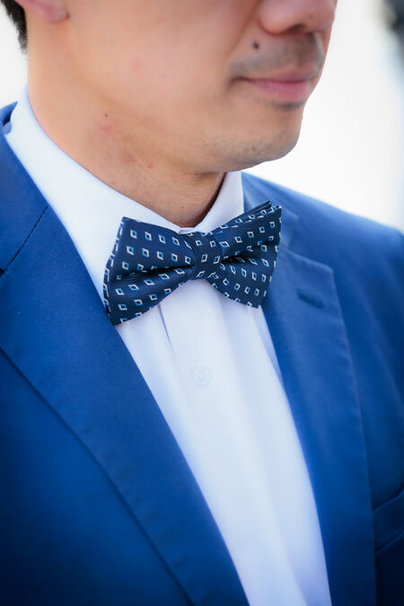 Close-up of groom's bow tie during a Sposi novelli Photo shoot