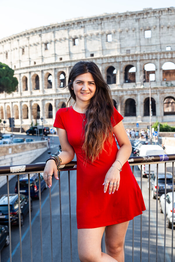 Portrait of girl in Rome with the Colosseum in the background