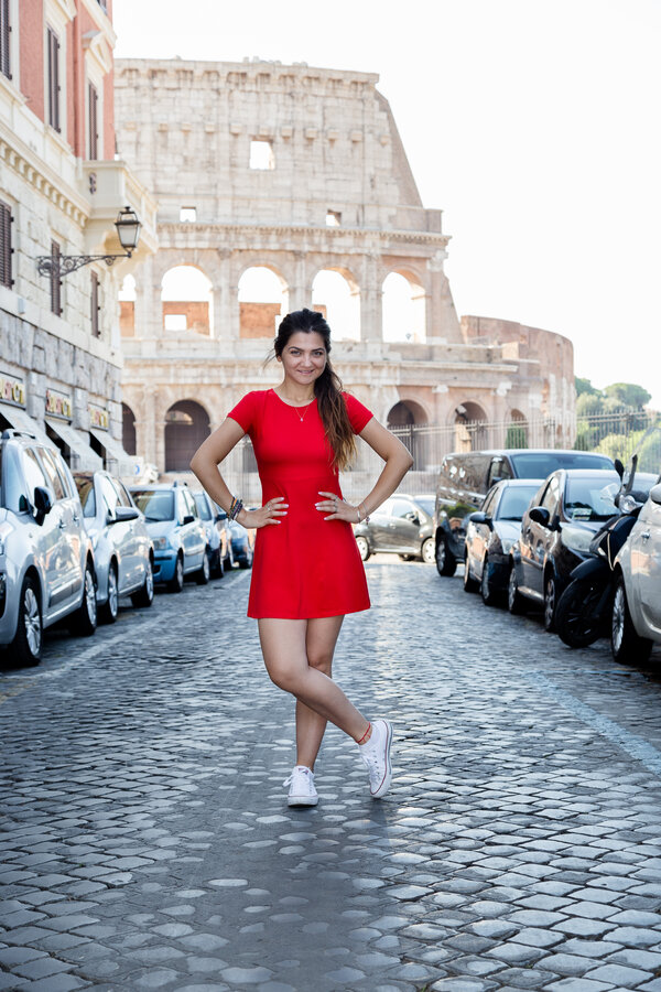 Beautiful portrait of girl during her photo shoot in Via del Colosseo, Rome