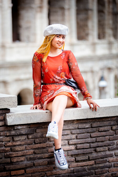 A bubbly girl during her solo vacation photo shoot in Rome
