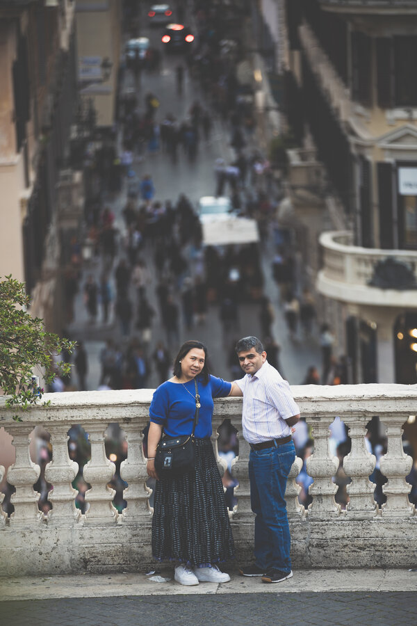 Couple on the Spanish Steps during their Vacation Photo Shoot in Rome