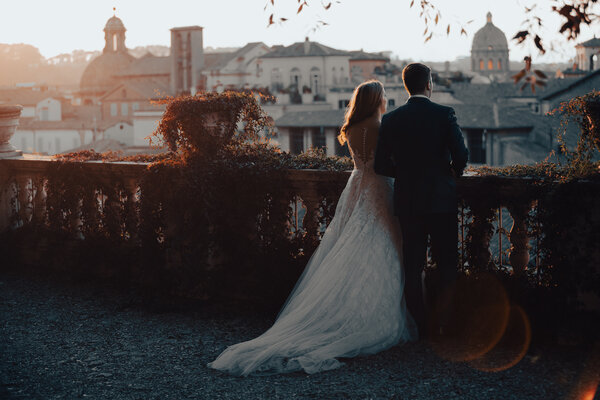 Bride and groom enjoying the scenary of the Ancient City from Terrazza Caffarelli