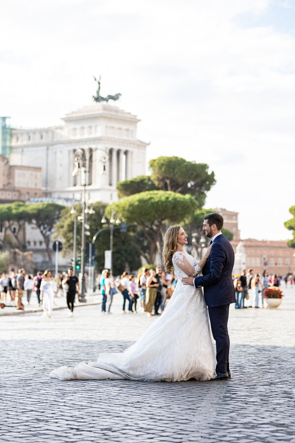 Newly-weds in Viale dei Fori Imperiali with the Vittoriano in the background