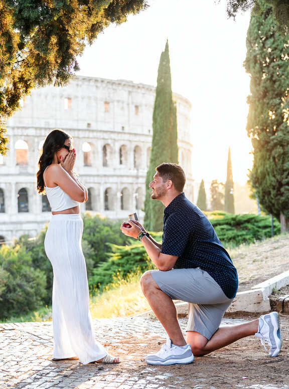 Surprise Wedding Proposal with a view to the Colosseum at sunset