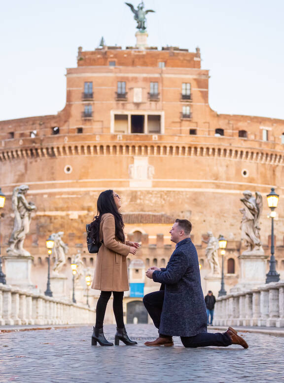 Surprise Proposal Photo Session in Rome on Castel Sant'Angelo Bridge