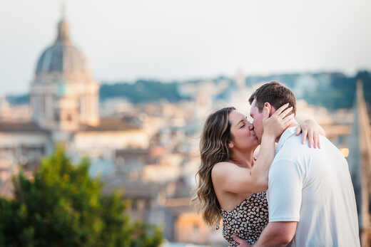 Proposal in Rome on the Terrazza Belvedere at sunset