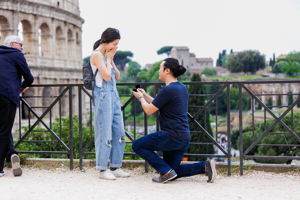 Charming Surprise marriage proposal with a view on the Colosseum