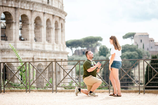 Surprise wedding proposal with a view on the Colosseum
