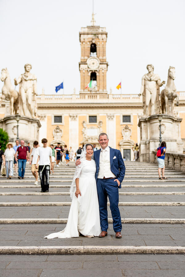 Smiling Sposi Novelli couple on the Capitoline Hill in Rome