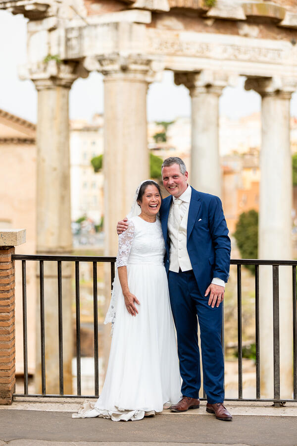 Happy Sposi Novelli couple at the Roman Forum lookout on the Capitoline Hill in Rome